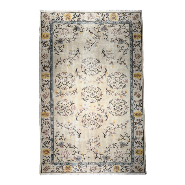 Vintage Turkish Floral Carpet – Hand-Knotted Elegance in Soft Pastels -6' 7'' X 10' For Sale