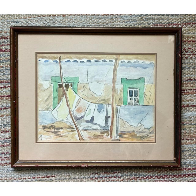 Original Spanish style architectural watercolor. Features a clothesline outside with two trees and windows. Signed to the...