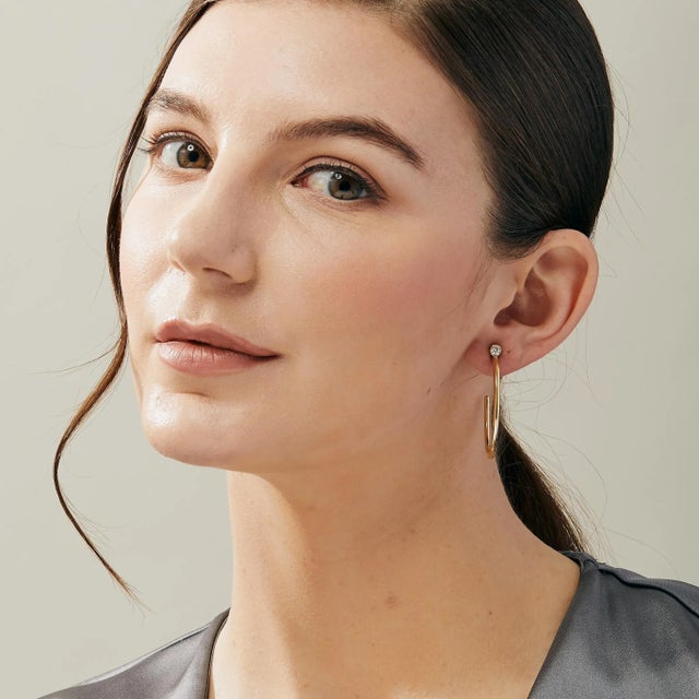 Created in 18 karat yellow gold Diamonds 0.30 carat approx. 18 karat yellow gold butterfly backs These stunning Cosmic...