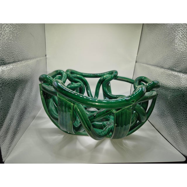 Make a bold statement with this striking organic modern ceramic centerpiece bowl. Finished in a rich, glossy emerald green...
