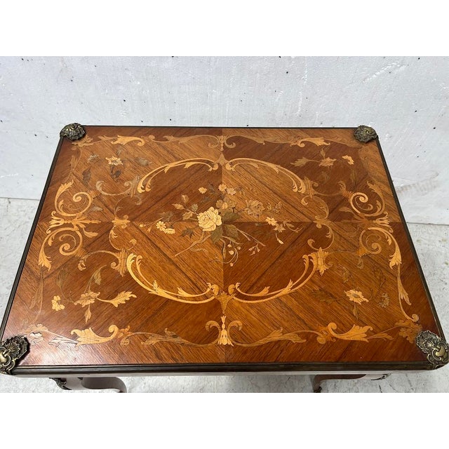 Louis xv style marquetry games table marquetry decorated with flowers and scrolls four cabriole legs with bronze mounts...
