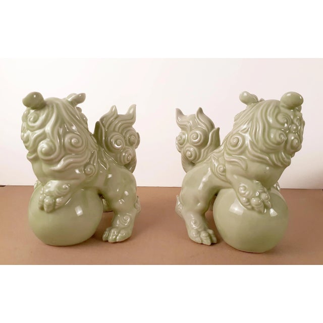 Chinese Mid Century Pair of Chinese Celadon Fu Dogs For Sale - Image 3 of 8