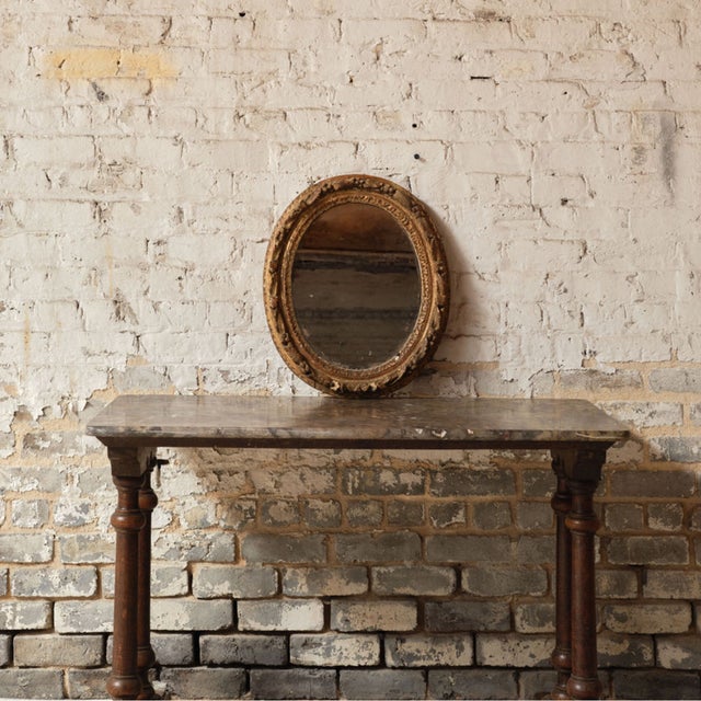 Add soft, decorative elegance to your space with this 19th century French oval plaster mirror, a beautifully crafted piece...
