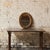 Add soft, decorative elegance to your space with this 19th century French oval plaster mirror, a beautifully crafted piece...