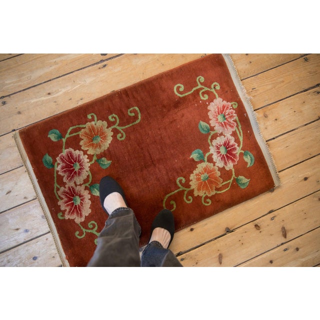 :: Open field with opposing mirrored reciprocal floral bouquets with delicately curved vines and large rosette blossoms....