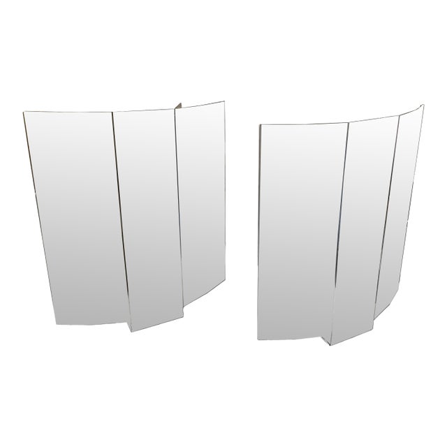 A Pair of 1980s Modern Steel Italian Ambient Light Wall Sconces For Sale