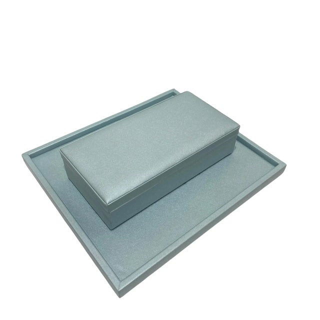 Teal leather square tray. Due to the natural handcrafted materials used, variation in size, shape, and color should be...