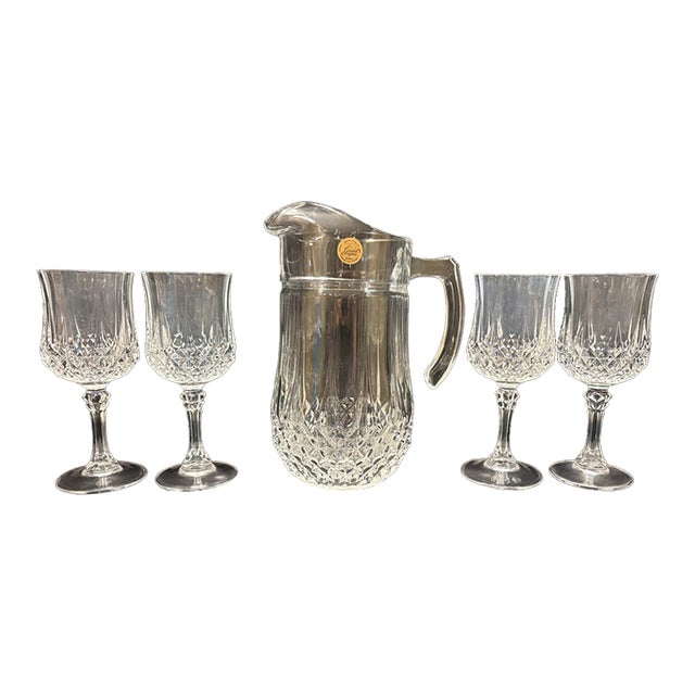 Late Twentieth Century Cristal D’Arques Lead Crystal Pitcher and Four Wine Glasses in the Longchamp Pattern For Sale