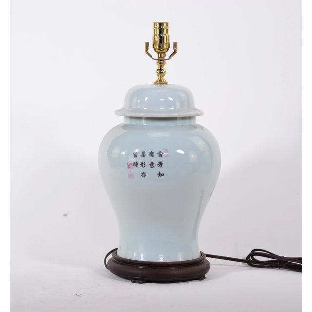 Chinese famille rose vase table lamp in the middle of the 20th century with floral, leaf and butterfly.
