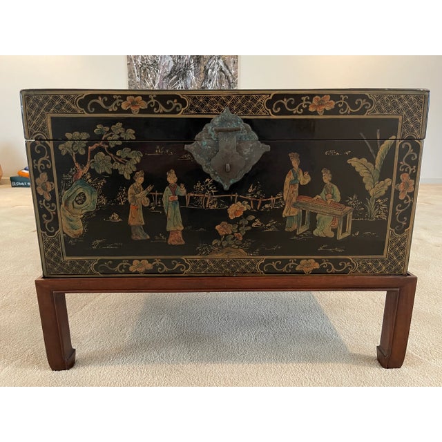 This antique trunk displays wonderful detailed hand paintings on three sides. It is in immaculate condition as displayed...