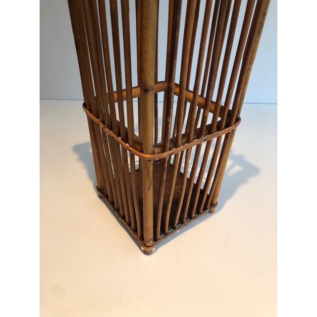 This beautiful and unusual umbrella stand is made entirely of rattan. It is a French work. Circa 1970