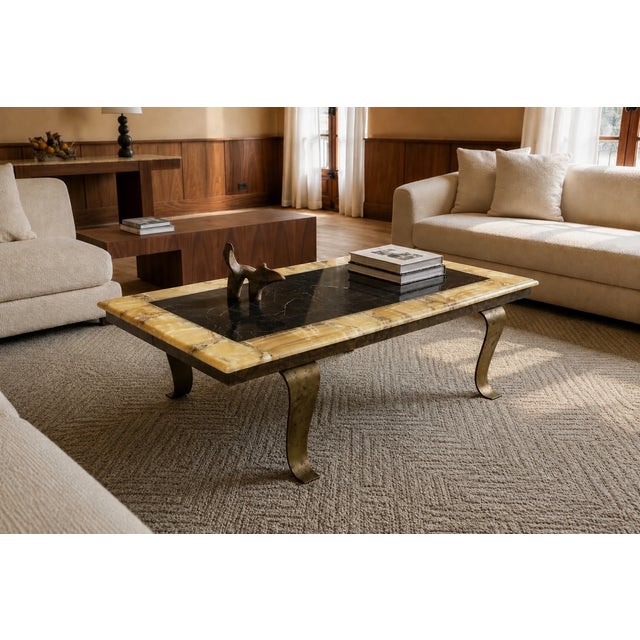 A striking sculptural coffee table designed by Arturo Pani for Muller of Mexico, circa 1960s. This refined statement piece...