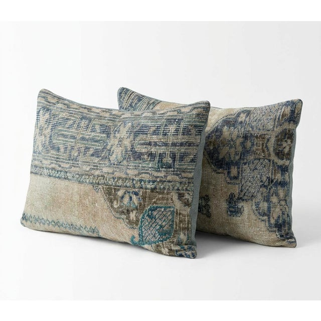 This beautiful 16'' x 24'' pillow cover set was made from authentic Turkish rug pieces. Bright colors of wool adorn the...