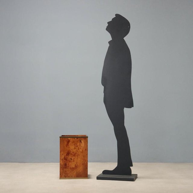Umbrella stand from the '70s-'80s made of burl wood veneer, enhanced by elegant brass profiles that add a touch of...