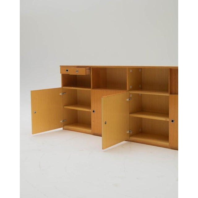 A sideboard with clean lines and a Nordic spirit, this piece stands out for its horizontal design and balanced...