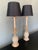 Wooden Pineapple Lamps with Lightly Distressed Gold Patina. Black Pleated Shades with Gold Lining. Fixture is Brass and...