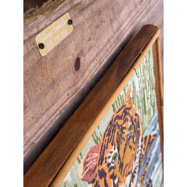 Wonderful vintage needlepoint textile depicting a striking tiger emerging from water with its reflection below. The design...