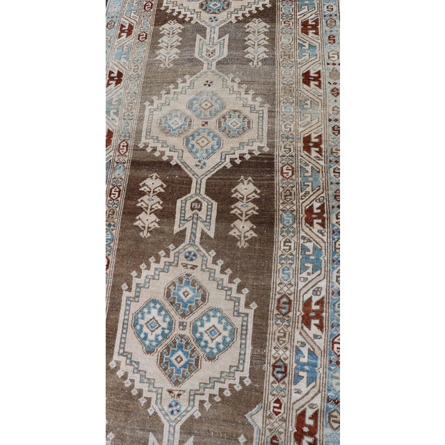 Tan Long Persian Heriz Runner With Central Medallions in Brown, Blue, Tan & Red For Sale - Image 8 of 12