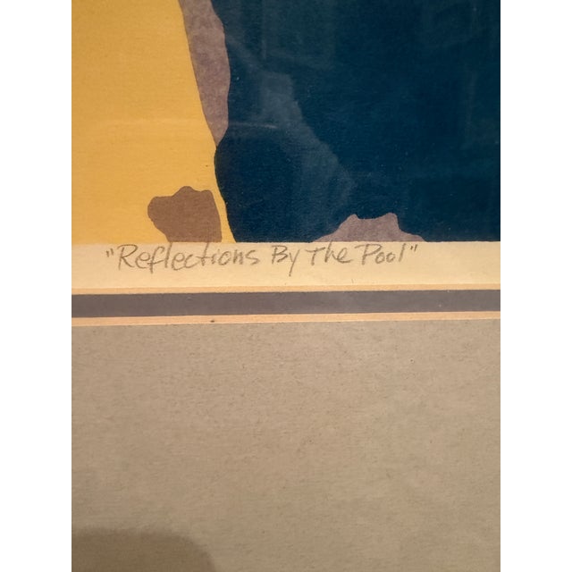 Original screenprint titled Reflections By The Pool. Pencil signed, titled, and numbered 9/29. Double matted in oak frame....