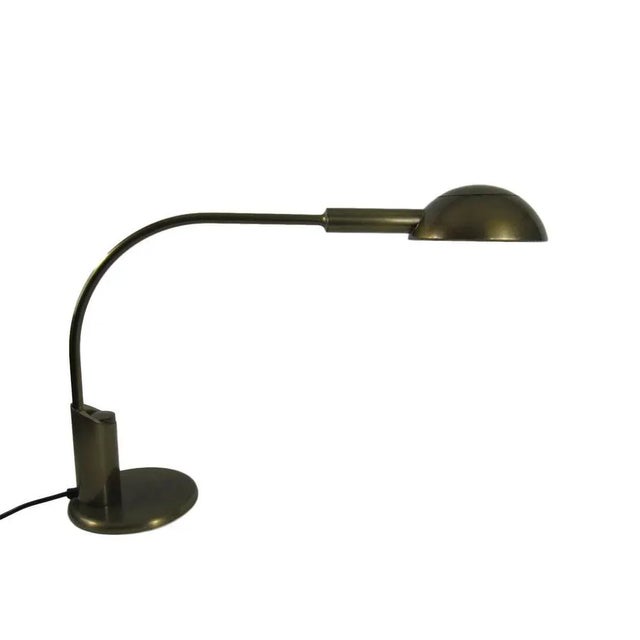 Florian Schulz desk lamp, very solid made of brass (matt) worked with swiveling arm. Light bulbs not included (required...