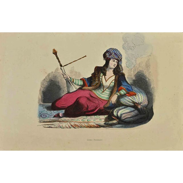 Persian Lady is a lithograph made by Auguste Wahlen in 1844. Hand colored. Good condition. At the center of the artwork is...