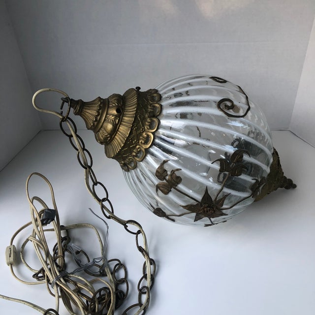 Fab Hollywood Regency round globe Pendant Hanging Swag Lamp. Opaque white and clear glass encased with gold brass...