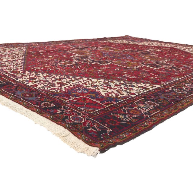 60307 Vintage Persian Heriz Rug, 08'10 x 12'01. Perpetually posh meets timeless elegance in this vintage Persian Heriz...