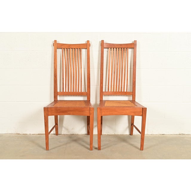A gorgeous pair of Arts & Crafts or Mission style side chairs or dining chairs In the manner of Stickley USA, Circa...
