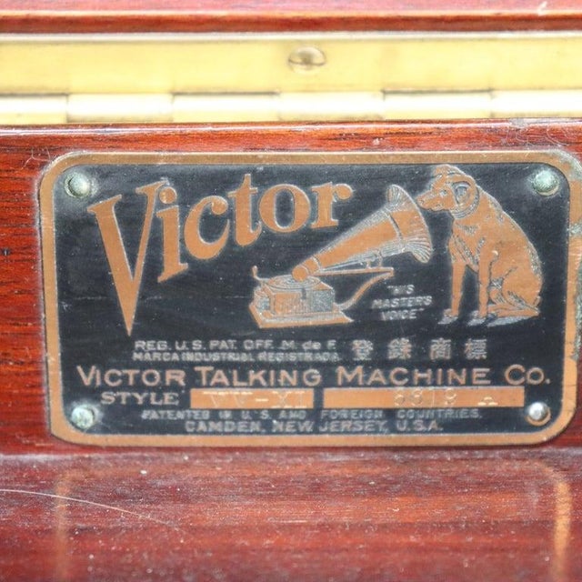 An antique tabletop phonograph, the Victrola VVXI model, manufactured by the Victor Talking Machine Company, circa 1920....