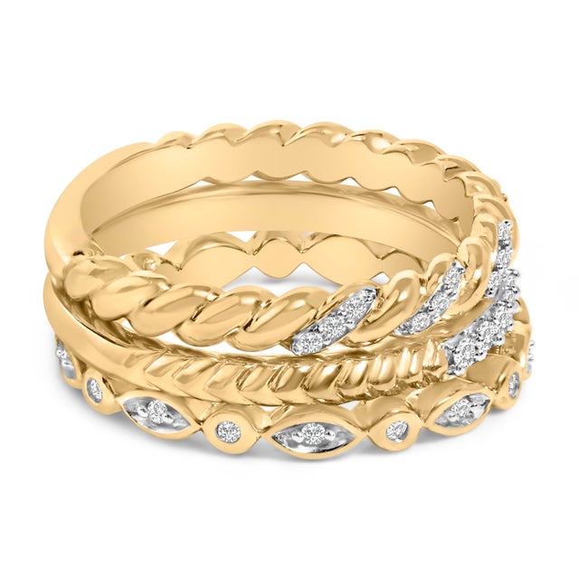 Encapsulate elegance and sophistication on your finger with this exquisite set of three stackable rings, meticulously...