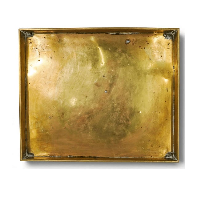 A mid-20th century Italian serving tray executed in solid brass with classic form, subtle detailing, and a rich aged...