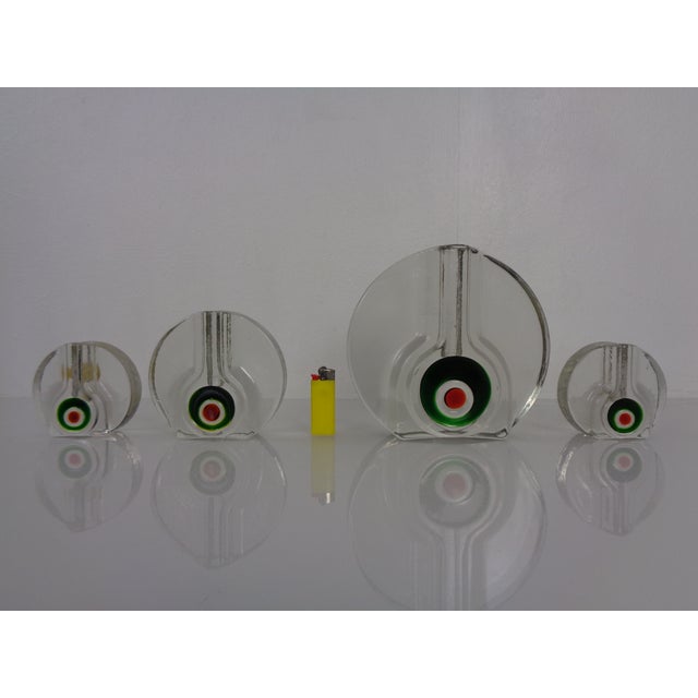 Set of four Pop Art glass vases by H. Düsterhaus for Walther-Glas from the 1960s. Height: 2 x 7.7/10.5/16 cm. Diameter:...