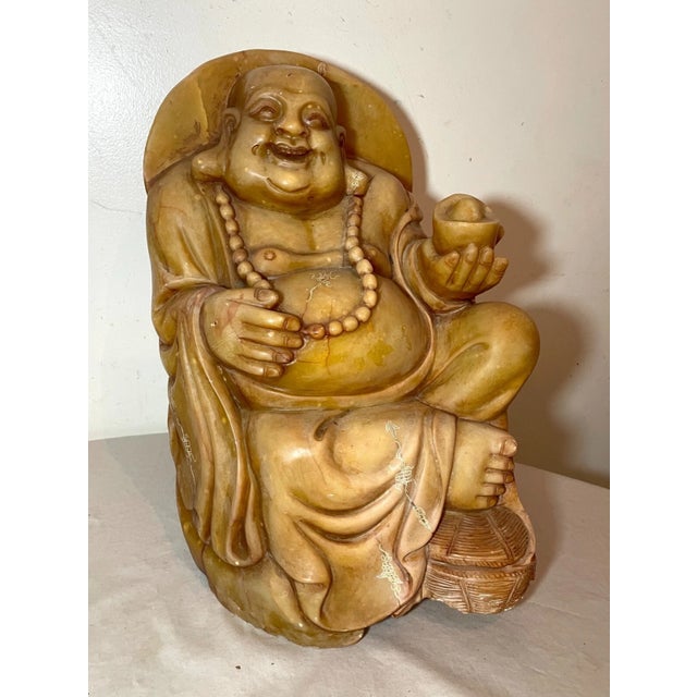 Experience the serenity and artistry of this vintage 55 pound Chinese Buddha sculpture, a testament to the rich cultural...