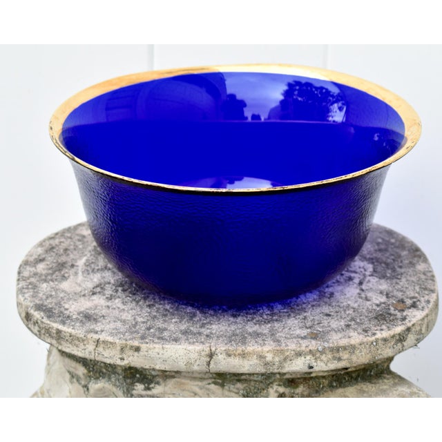 Vintage (1950's) Round Pebble Textured Bowl with Gold Rim. This Bowl has an MCM Style in a Vibrant Cobalt Blue Color. The...