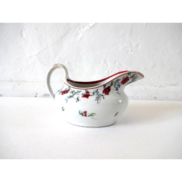 An antique Georgian English New Hall white porcelain creamware pitcher, creamer, or small sauce or gravy boat. Late 18th-...