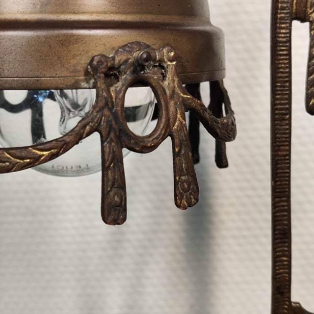 A sophisticated example of early 20th-century lighting design, sourced from Retorbido, Italy. This desk lamp seamlessly...