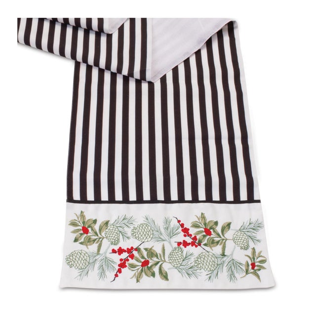 Elevate your holiday decor with this Striped Christmas Table Runner! Featuring timeless black and white stripes with...