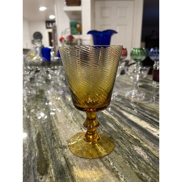 Set of three stunning honey gold swirled glass goblets, 1960’s - 1970’s These three goblets appear to be mouth blown glass...