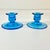 These are a pair of gorgeous turquoise ocean blue Depression Era glass candle holders. The design is a tulip cup on a low-...