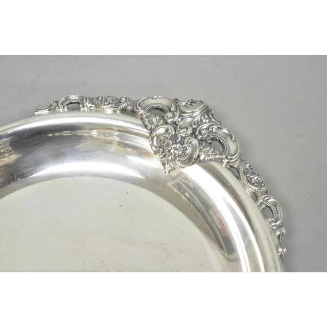 Vintage Wallace "Baroque" Pattern Silver Plated Round Serving Platter Tray with Floral Repousse Twin Handles. Circa Mid...