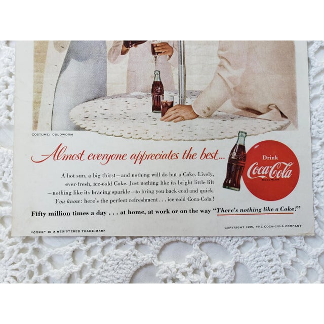 A charming vintage Coca-Cola advertisement featuring a chic American family. Ready to frame! This beauty measures...