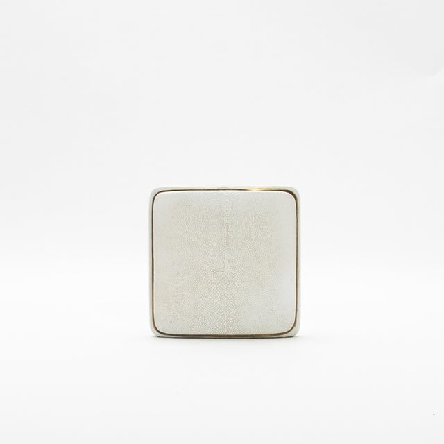The Square Shagreen Vase by R&Y Augousti is a perfect blend of luxurious materials and refined craftsmanship. Its compact,...