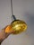 An atmospheric highlight of the 1970s: This brown pendant lamp brings the unmistakable, cozy look of the Space Age era...