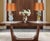Elegant and highly decorative pair of vintage porcelain figural table lamps featuring a colonial-era courting couple...