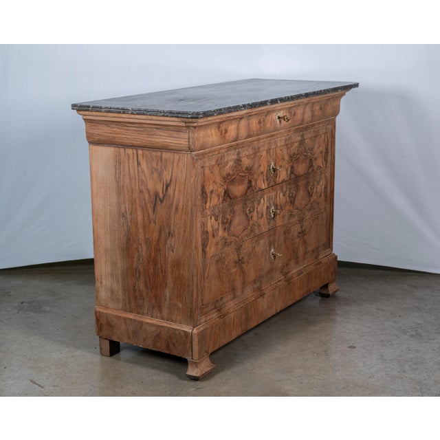 Indulge in the refined beauty of our 19th Century French Louis Philippe Walnut Commode, meticulously restored to its...