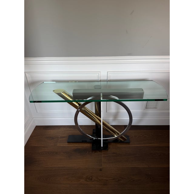 An iconic Postmodern sculptural console table designed by Kaizo Oto for Design Institute America circa 1990. This striking...