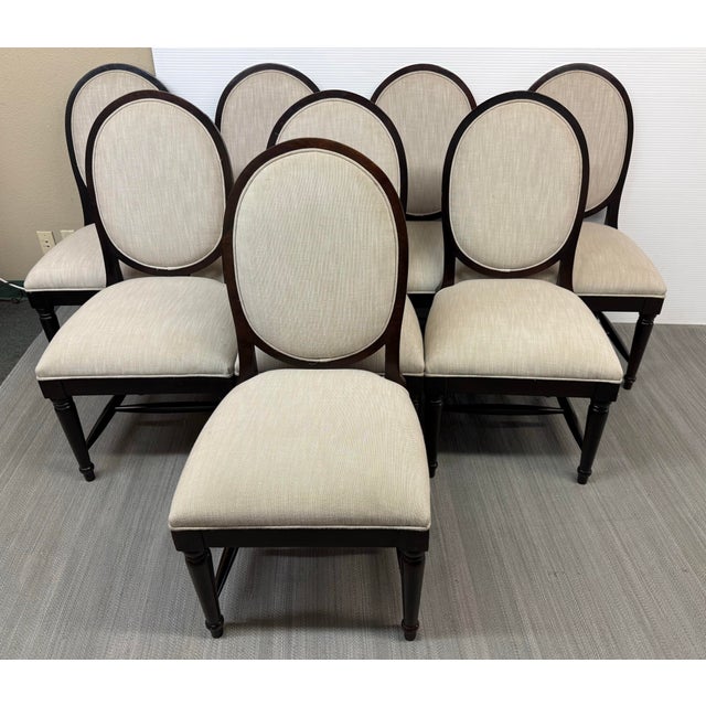 Design Plus Gallery presents a Set of Eight Oval Back Dining Chairs in the Louis XVI Style from Alexander Furniture Co....