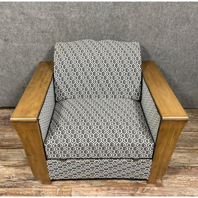 Rare Art Deco tulip armchair convertible into a bed, made of light wood, circa 1925. Fully reupholstered with an elegant...