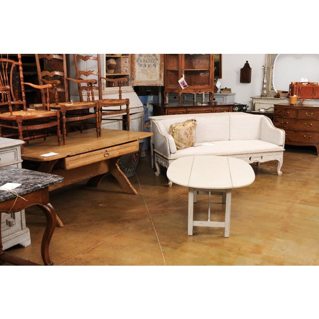 Cream Swedish 1920s Painted Drop Leaf Coffee Table with Oval Top and Stretcher For Sale - Image 8 of 11