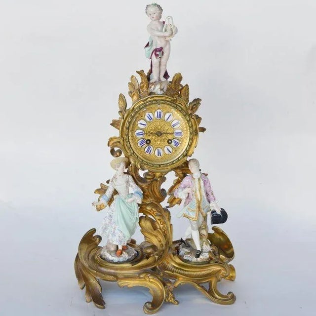 Classical Meissen porcelain and gilt bronze clock by Japy Freres Grand Med D'Honneur. Made in France, 19th Century. *Each...